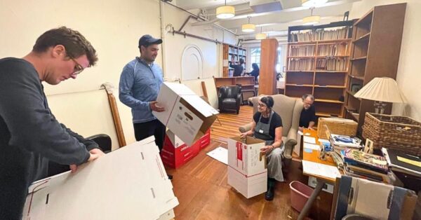 Volunteers packing up the City Center library