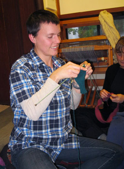 Lauren Dito Keith: “I taught myself out of a book in 2006, but knitted only scarves until six months ago, when I made my first hat.” Now she is finishing a pair of fingerless gloves, as one of several gift projects.
