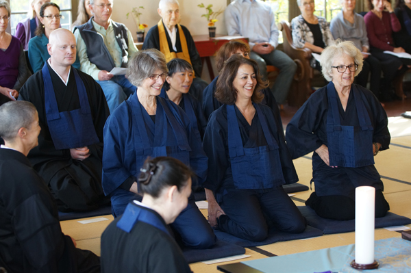 Lydia Linker (bottom, facing right) assists the ordinands in last Saturday's Jukai. (Photo: Marcus Marchesseault.)