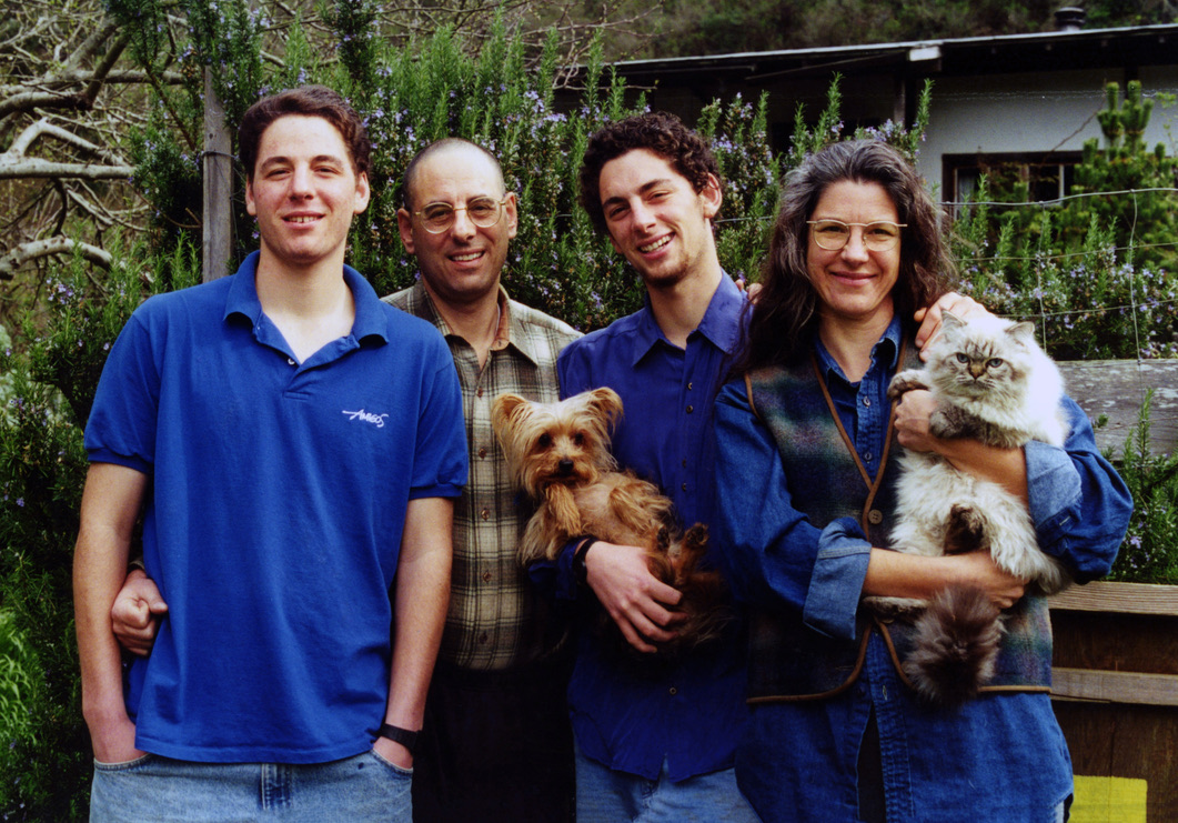 Kathie, Norman, and their two sons.